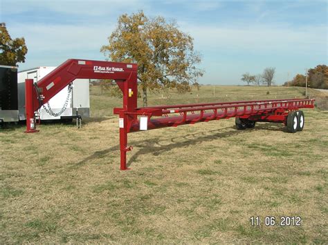9 large bails - 16' unit. . Used self unloading hay trailers for sale